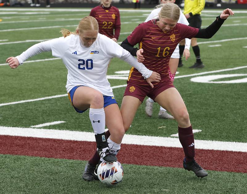 Johnsburg's Kayla Hiller battles with Richmond-Burton's Elle Barrettsmith for control of the ball during a Kishwaukee River Conference soccer game on Tuesday, April 1, 2025, at Richmond-Burton High School.