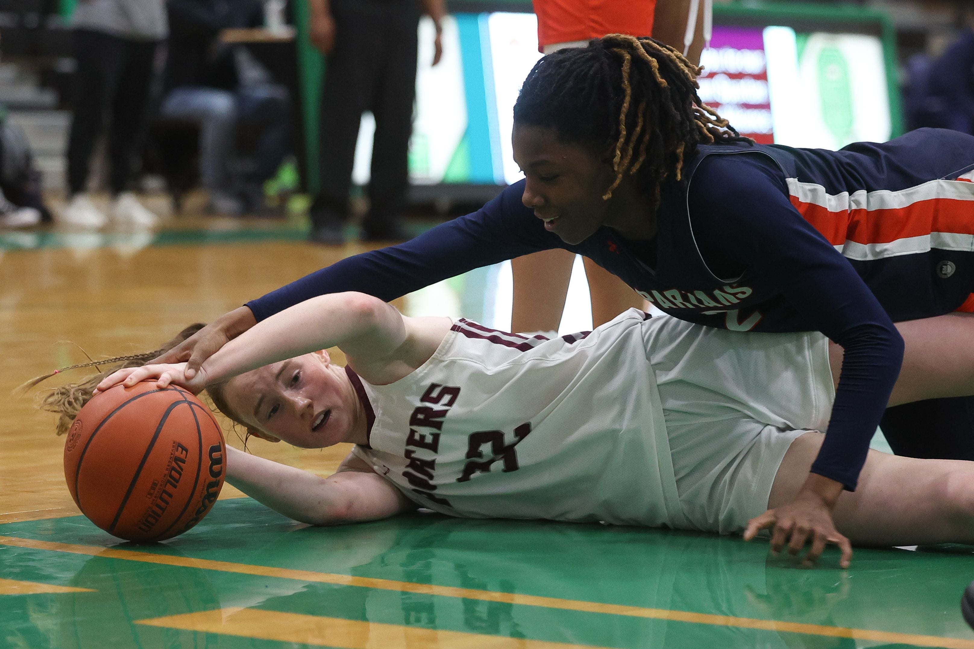 Lockport’s Lucy Hynes tries to keep the ball away from Romeoville’s Kazaria Smith in the Oak Lawn Holiday Tournament championship on Saturday, Dec.16th in Oak Lawn.