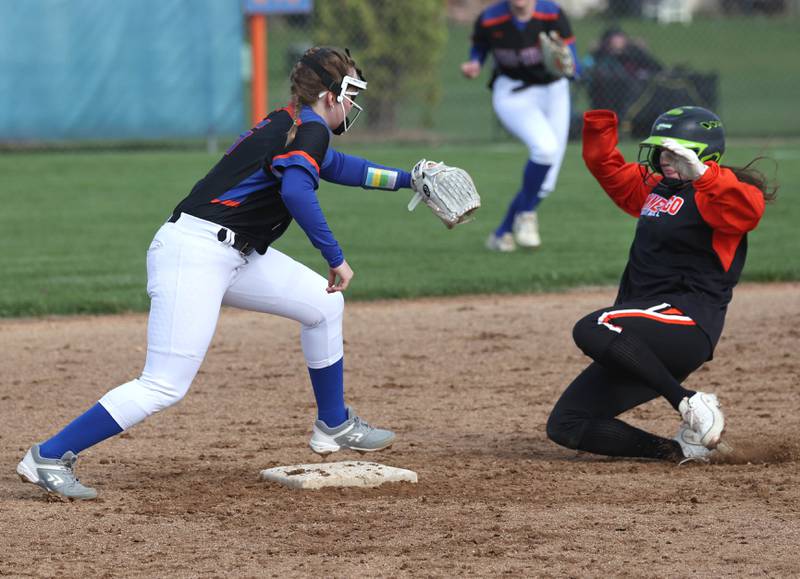 Genoa-Kingston’s Kaylee Luepkes gets ready to tag out Winnebago’s Kyla Warkentien on a steal attempt during their game Monday, April 21, 2025, at Genoa-Kingston High School.