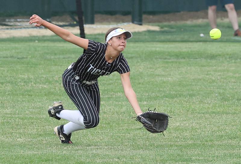 Crystal Lake Central's Brooklyn Johnson makes a diving catch for the third out to prevent Sycamore, who had runners on base, from scoring Tuesday, June 3, 2025 during their Class 3A sectional semifinal game at Sycamore High School.