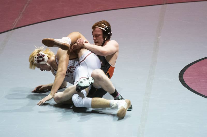 Crystal Lake Central's Connor Lezama gets control of Prairie Ridge's Charlie Ferree during the 152 pound match on Thursday, January 6, 2022 at Prairie Ridge High School in Crystal Lake.