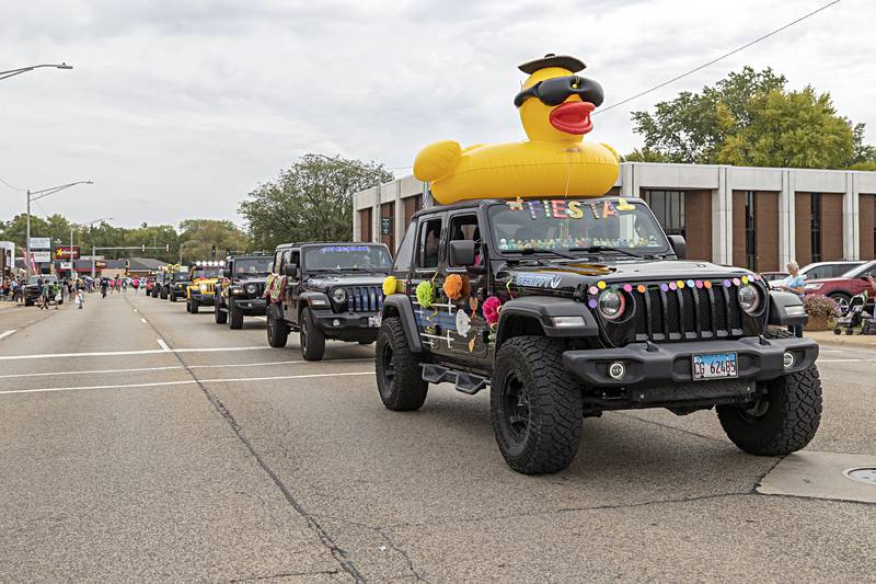 Jeep enthusiasts line up during the Fiesta Days parade Saturday, Sept. 16, 2023.