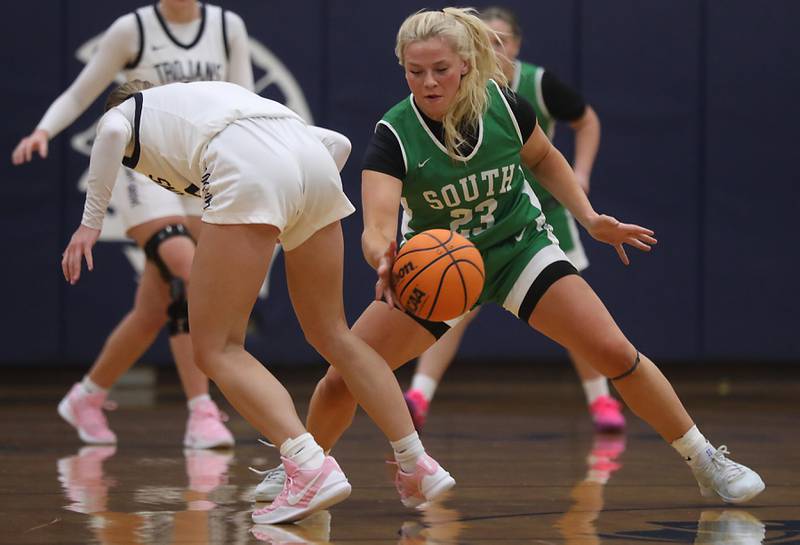 Crystal Lake South's Laken LePage steals the ball from Cary-Grove's Ava Santucci during a Fox Valley Conference girls basketball game on Tuesday, Dec. 2, 2025, at Cary-Grove High School in Cary.