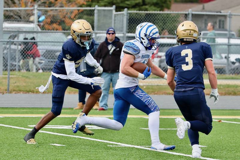 Princeton's Casey Etheridge runs against Bloomington Central Catholic in Saturday's 3A playoff opener in Bloomington. He rushed for 146 yards and finishes his career ranked No. 18 all-time in the IHSA with 5,345 yards.