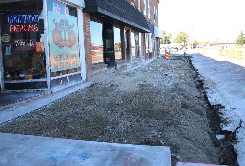 Crews remove chunks of a sidewalk at the corner of Jefferson and Main Street on Monday, Oct. 27, 2025 in Mendota. The City of Mendota is reconstructing sidewalks to comply with ADA accessibility. The project includes 2,100 square feet of sidewalk, 184 feet of curb and gutter, asphalt patching and other miscellaneous improvements.
