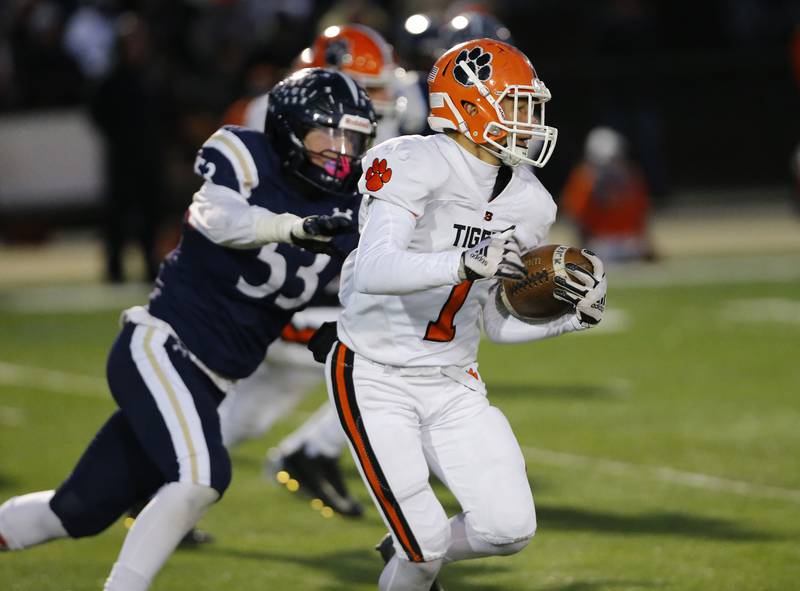 Byron's Brayden Knoll (1) runs the ball during the Class 3A varsity football semi-final playoff game between Byron High School and IC Catholic Prep on Saturday, Nov. 19, 2022 in Elmhurst, IL.