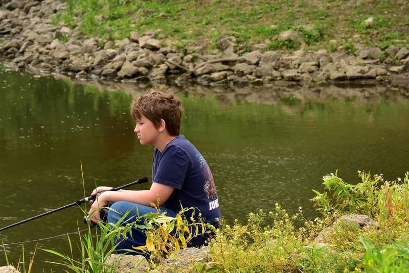 Tucker Crandall, 12, of Prophetstown, waited patiently for a bite  Saturday morning, June 14, 2025, at Prophetstown State Park during the 19th annual Dick Brown Fishing Derby. The derby has actually been hosted for over 50 years, it was formerly named the Bob Ferran Fishing Derby.