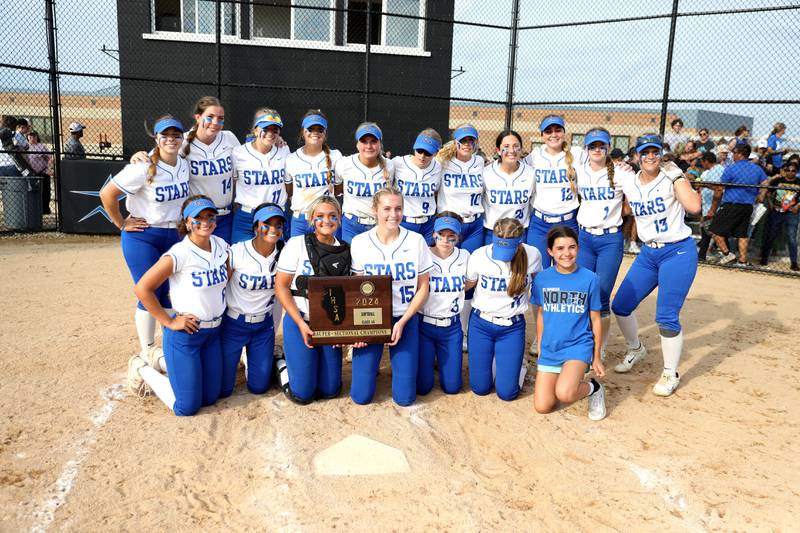 St. Charles North players celebrate their Class 4A St. Charles North Supersectional win over Whitney Young on Monday, June 3, 2024.