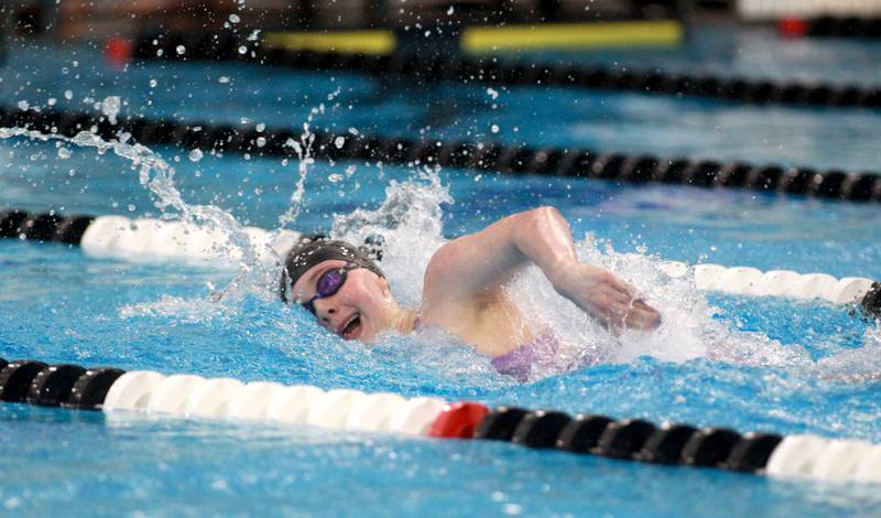 Rosary’s Bella Wojtowicz competes in the 400-yard freestyle relay championship heat during the IHSA Girls State Swimming and Diving Championships at the FMC Natatorium in Westmont on Saturday, Nov. 11, 2023.