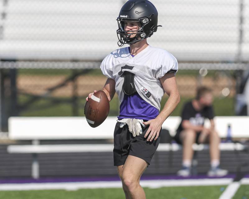 Max Troha works with the receivers at Downers Grove North High School football practice, Thursday, Aug 14, 2025  in Downers Grove.