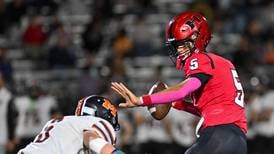 Malik Carter throws 5 TDs, Huntley tops McHenry to keep playoff hopes alive 