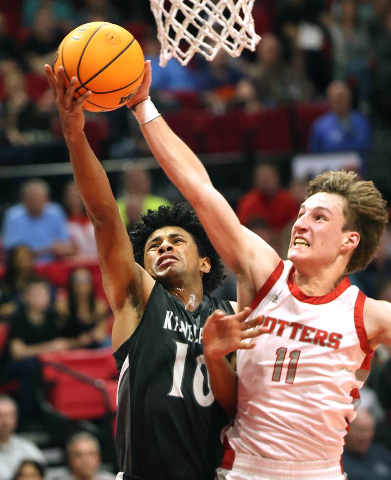 Kaneland's Jalen Carter has his shot blocked by Morton's Owen Adams Monday, March 9, 2026, during their IHSA Class 3A supersectional matchup in the Convocation Center at Northern Illinois University in DeKalb.
