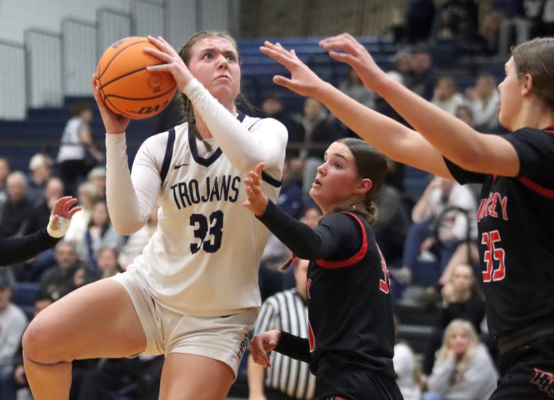 Cary-Grove’s Elizabeth Mjaanes looks to the hoop against Huntley in varsity girls basketball on Friday, Jan. 24, 2025, at Cary-Grove High School in Cary.