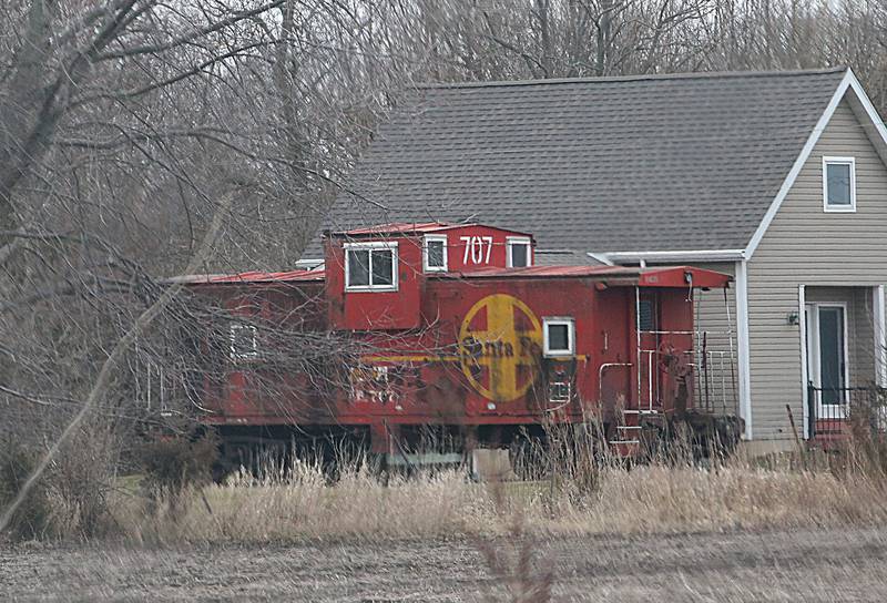 This real caboose is located next to a home at the intersection of East 12th Road and North 2803 Road on Tuesday, March 28, 2023 about three miles east of Utica.