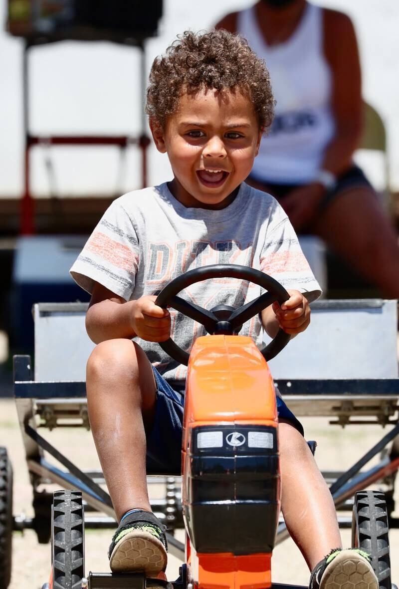Kids were able to drive around individual tractors during Beef and Ag Days.