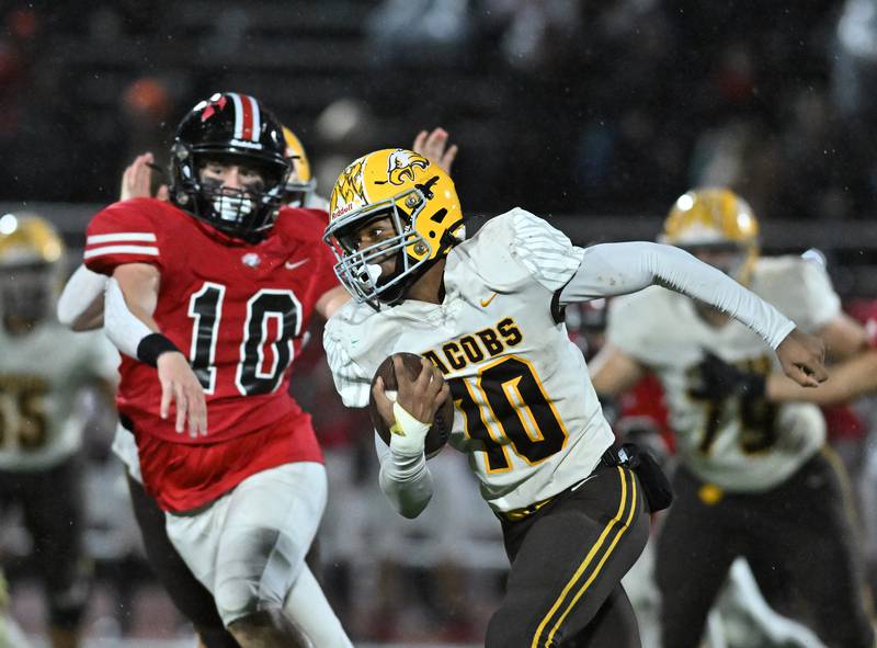 Jacob's Jayden Gaona tries runs the ball during the class 7A first round  playoff game against Lincoln-Way Central on Friday, Oct. 27, 2023, at New Lenox. (Dean Reid for Shaw Local News Network)