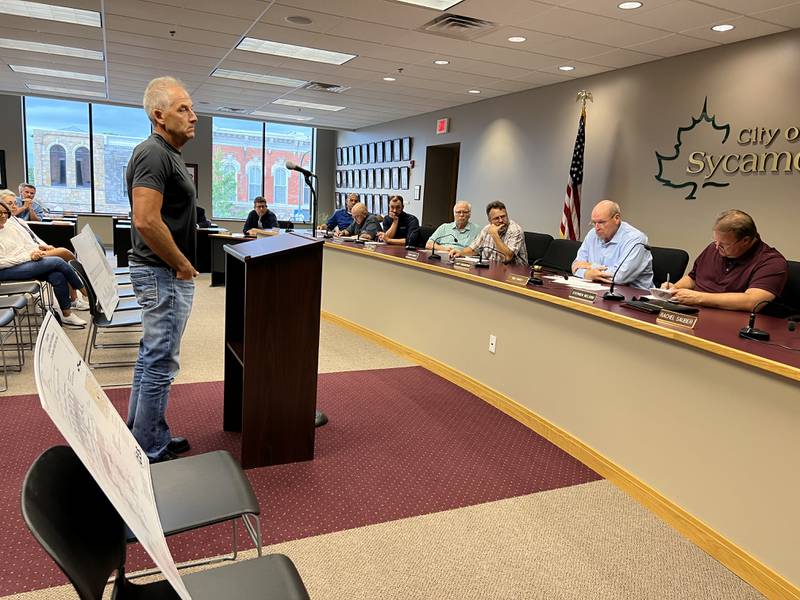Kurt Kozlowski speaks with Sycamore's Planning and Zoning Commission during a workshop on Home Run Group's proposal to develop a parcel of land along Hathaway Dr. Kozlowski hopes the board will consider rezoning the property to R3.
