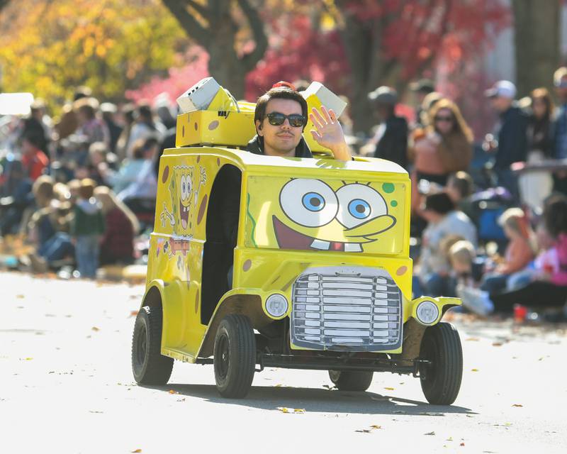 A motorized SpongeBob SquarePants from the Nickelodeon children's cartoon of the same name travels through the Pumpkin Parade route on Sunday Oct. 28, 2024, downtown at the 63rd annual Sycamore Pumpkin Festival.