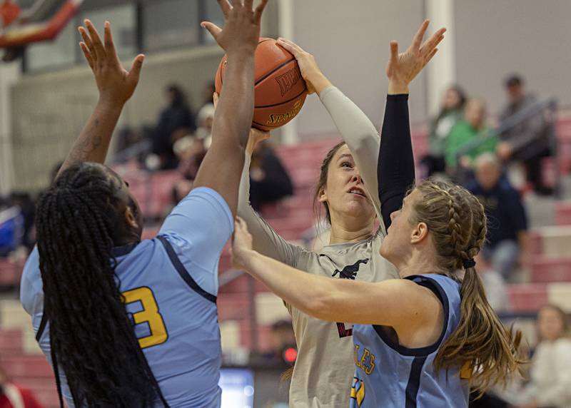 Sauk Valley College’s Shelby Veltrop works in the lane against Rock Valley Tuesday, Nov. 21, 2023 at SVCC.