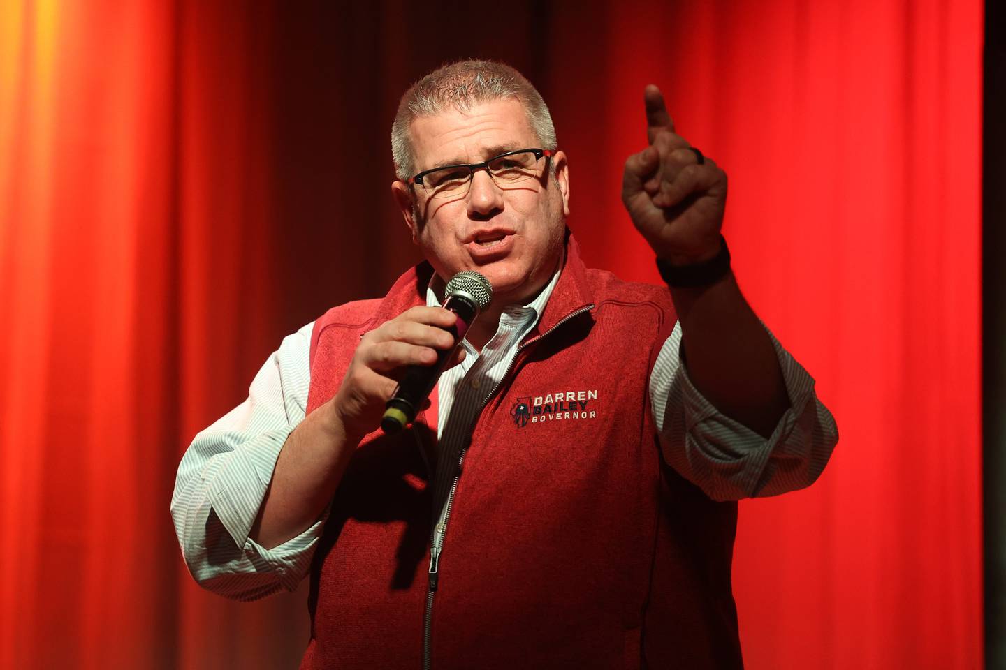 Darren Bailey, Republican candidate for Illinois Governor, speaks at the GOP rally at 115 Bourbon Street in Merrionette Park on Monday.