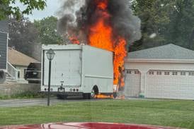 Cab burns delivery truck Friday in Woodstock; nearby garage, house spared