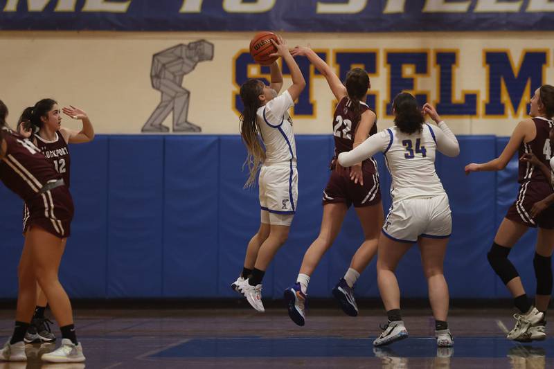 Joliet Central’s Elliana Fowler puts up a shot against Lockport.