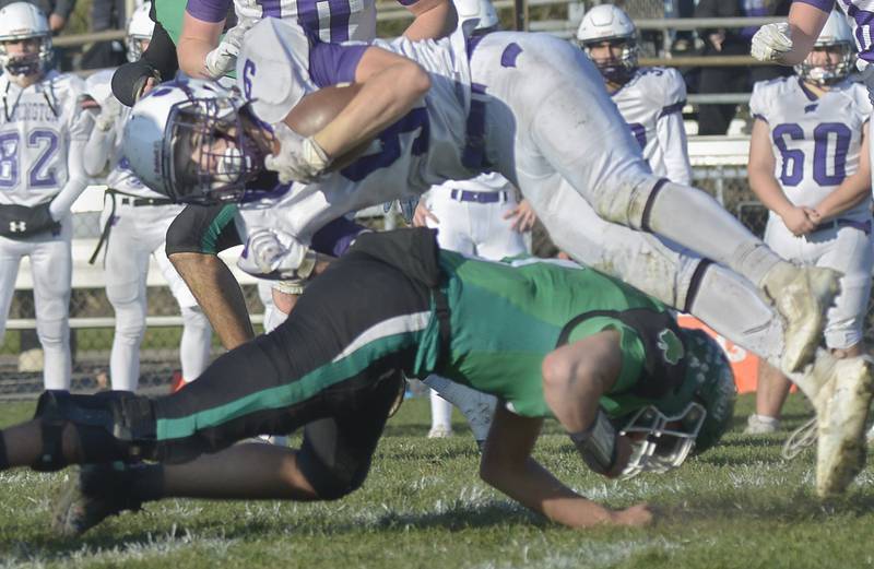 Seneca’s Nathan Grant upends Wilmington’s Ryan Kettman  on a run in the 3rd quarter Saturday during the Class 2A Quarterfinal at Seneca.