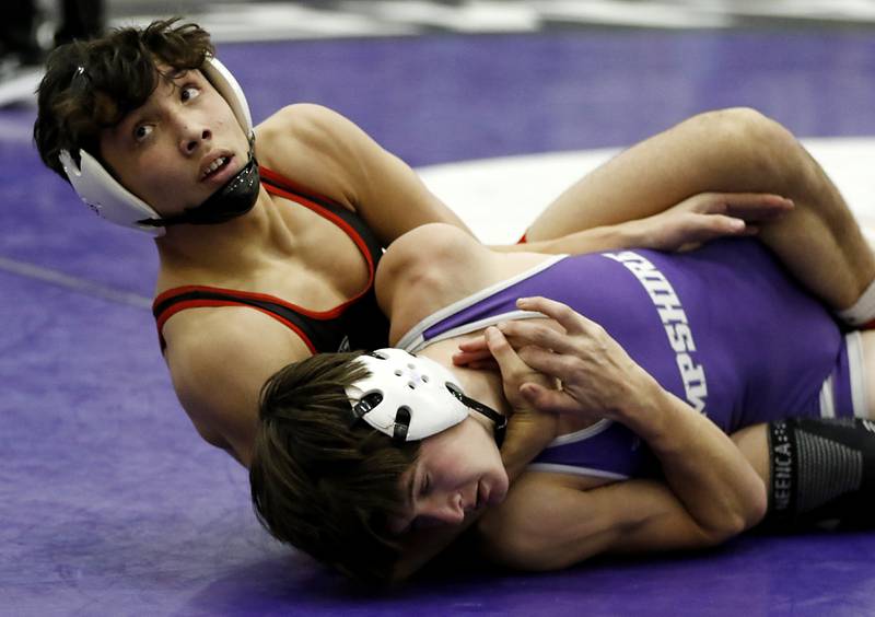Huntley's Cameron Abordo tries to control Hampshire's Lou Jensen during the 120-pound match of a Fox Valley Conference wrestling meet on Wednesday, Jan. 8, 2025, at Hampshire High School.