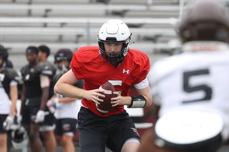 Plainfield North’s Connor Gregory looks for a play during a scrimmage against Joliet Catholic on Thursday, July 13th, 2023 at Plainfield North.