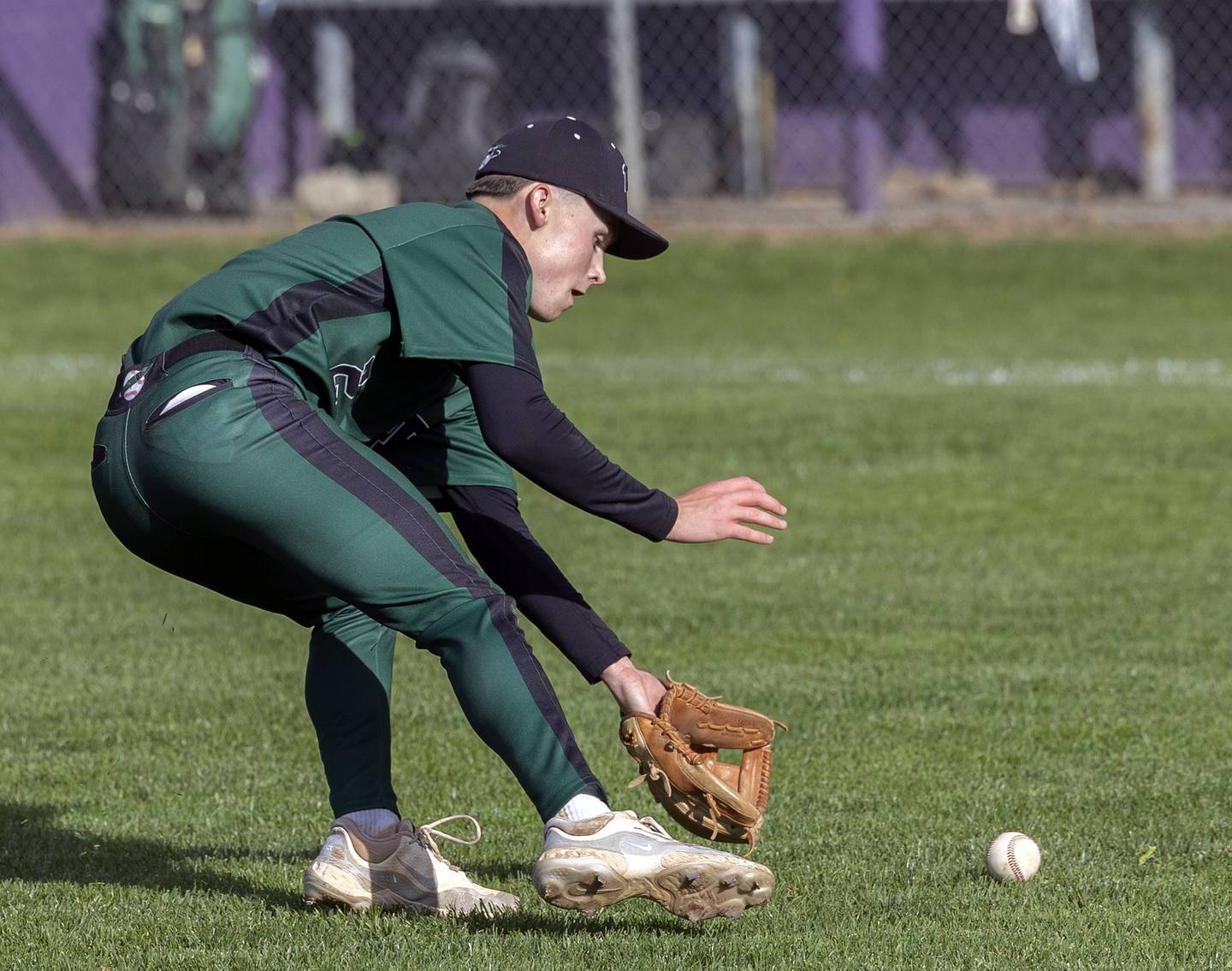 Rock Falls’ Ethan Mathews comes off the mound to field a bunt against Dixon Tuesday, April 29, 2025.