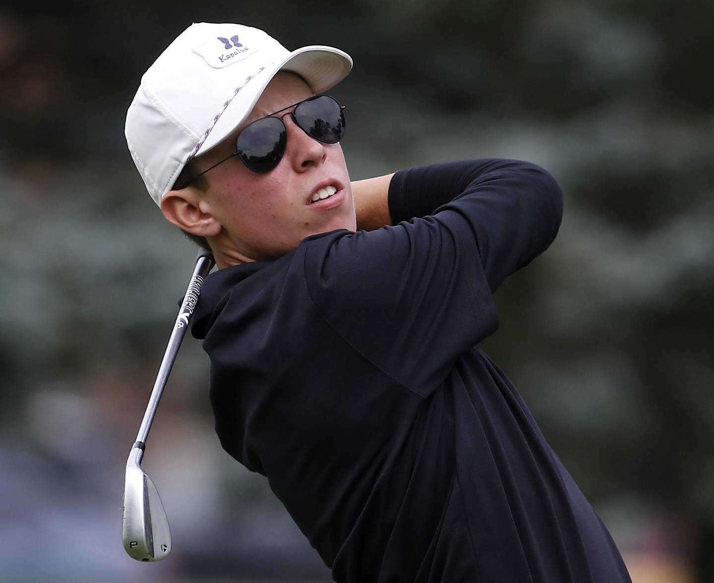 Crystal Lake Central’s Jack Bice watches his tee shot on the 18th hole during the Fox Valley Conference Boys Golf Tournament Thursday, Sept. 21, 2023, at McHenry Country Club in McHenry.