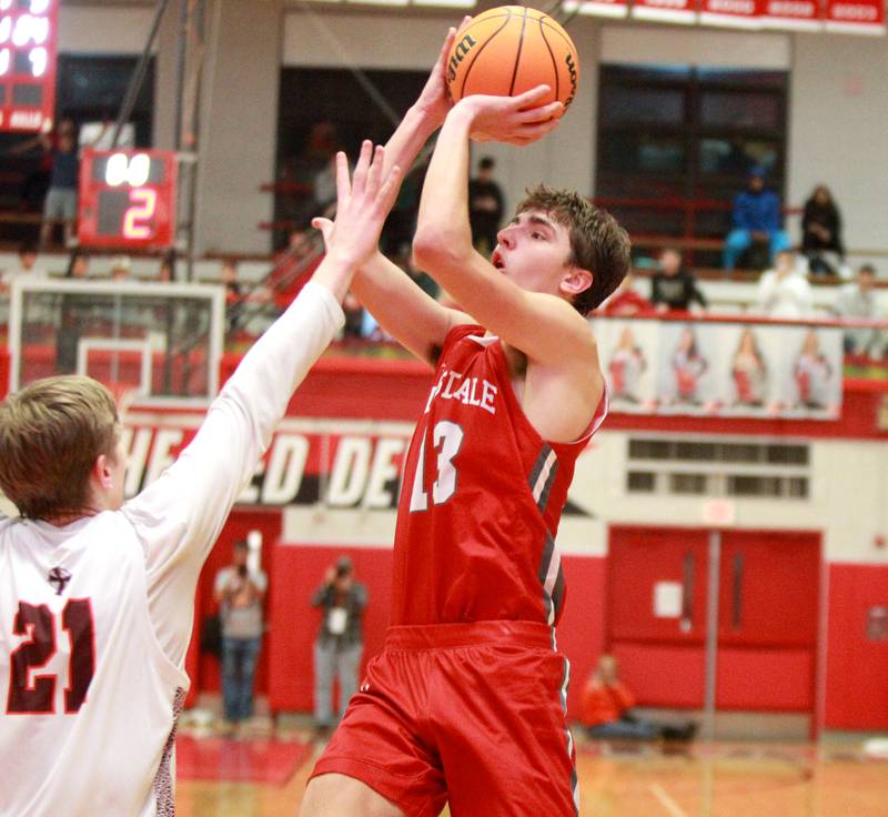 Hinsdale Central’s Michael Howell shoots the ball during the Hinsdale Holiday Classic championship game against Brother Rice on Monday, Dec. 30, 2024 in Hinsdale.