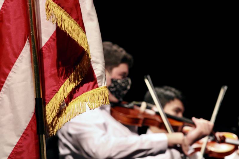 Members of the Sterling High School Orchestra perform "American the Beautiful" during a Veterans Day observance on Thursday, Nov. 11, 2021, at Centennial Auditorium.