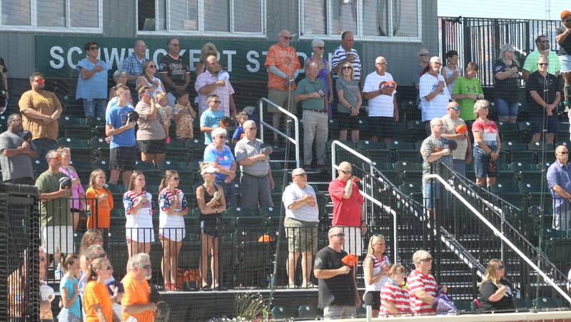 Fans stand for the National Anthem before the Illinois Valley Pistol Shrimp game honoring Veterans on Thursday, July 3, 2025 at Schweickert Stadium in Peru.