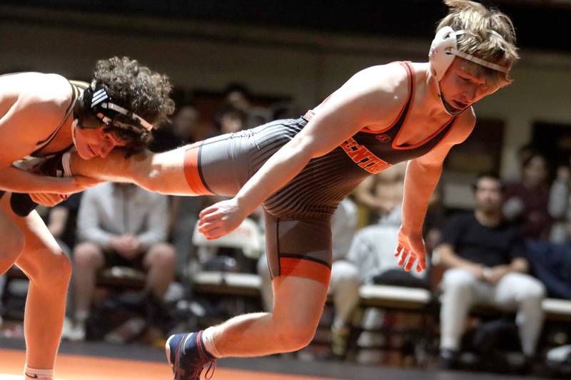 Crystal Lake Central’s Dylan Ramsey eludes Jacobs’ Gavin Greco at 126 pounds in varsity boys wrestling on Tuesday, Jan. 20, 2026 at Crystal Lake Central High School in Crystal Lake.