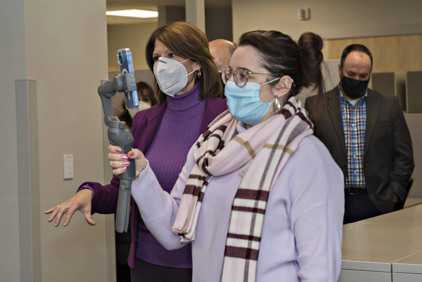 Congresswoman Bustos asks about how the new facilities will further benefit local patients during a tour of the facility.