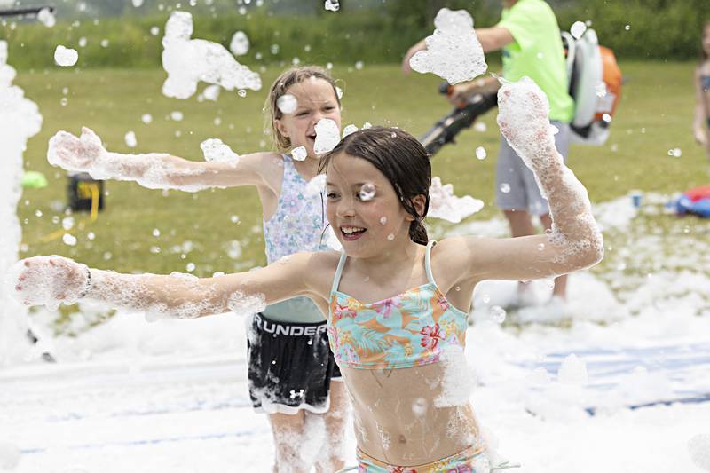 Dixon Park District SPARK campers were treated Thursday, June 15, 2023 to a foam machine on the grounds of The Facility as part of the day camp.