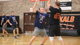 Photos: DeKalb District 428 faculty face off against first responders in holiday charity basketball game for area children