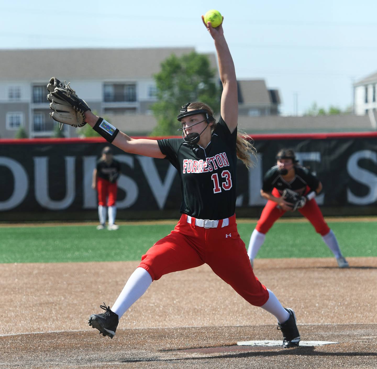 Forreston's Kara Erdmann delivers a pitch during action against Newark in the 1A third place game on June 4 in Peoria. The Cardinals beat Newark 4-2.