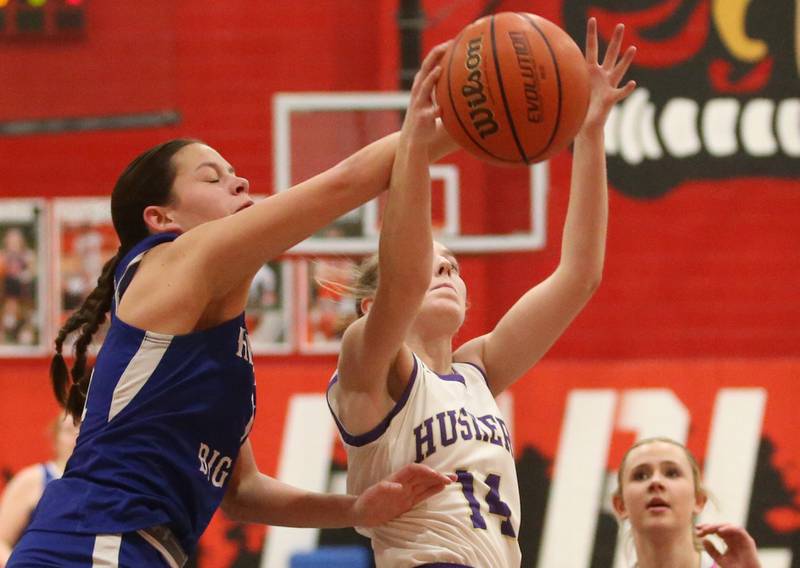 Serena's Macy Mahler eyes the hoop as Hinckley-Big Rock's Raven Wagner fouls her in the lane during the Little Ten Conference championship game on Friday, Jan. 24, 2025 at Earlville High School.