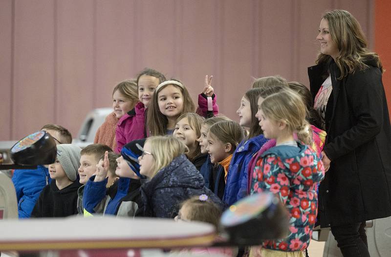 First graders have their picture taken after their round of bowling Tuesday, Jan. 28, 2025. Organizers with the Home and School Association at St. Mary’s School in Sterling planned the trip to the alley for Catholic Schools Week.