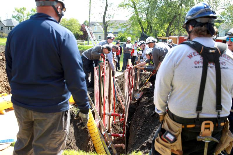 The Kane County Technical Rescue Team, which is made up of fire and medic responders from Elburn, Geneva, St. Charles, North Aurora, St. Charles, Aurora, Batavia and West Chicago, participate in a trench rescue training exercise in Geneva on Friday, May 10, 2024.