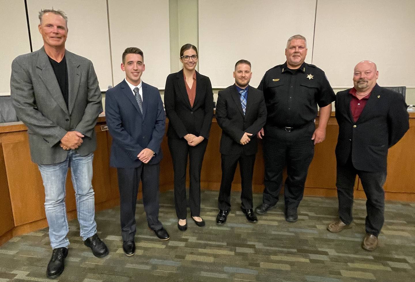 Three new police officers, Austin Svehla, Mary Tesinsky and Jesse Kidd, were sworn in by Village President Troy Parlier, and witnessed by Police Chief Jeff Burgner and commissioner Ron Elvin at Oswego Village Hall on Sept. 6 2022.
(left to right: Parlier, Svehla, Tesinsky, Kidd, Burgner, Elvin)