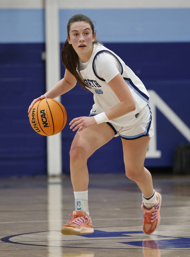 Nazareth's Sophia Towne (5) handles the ball during the girls varsity basketball game between Bolingbrook high school and Nazareth Academy on Monday, Jan. 12, 2026 in La Grange Park.