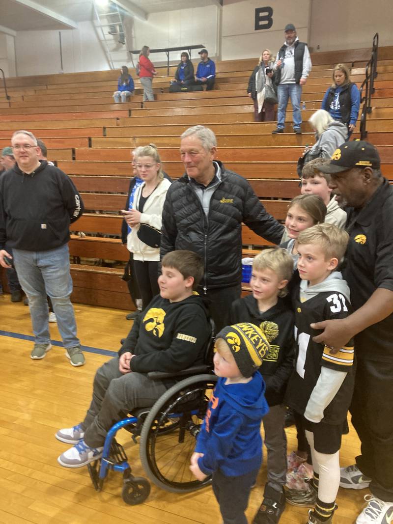 Iowa Hawkeye football coach Kirk Ferentz met with fans of all ages at Tuesday's Princeton basketball game.