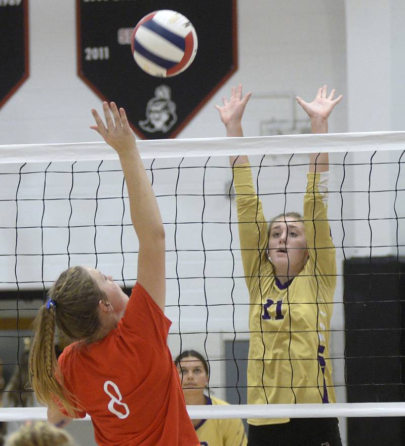 Woodland’s Grace Longmire (8) tips the ball as Serena’s Makayla McNally (11) rises to block Tuesday, Sept. 5, 2023, in rural Streator.