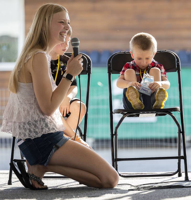 Host Abbi Merrill smiles while interviewing James Hardin Thursday, June 26, 2025, during Polo’s Little Miss and Mister pageant.