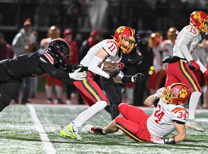 Batavia's Brett Berggren (11) runs the ball during the Class 7A semifinal playoff game against Lincoln-Way Central on Saturday, Nov 23, 2024 at New Lenox. (Dean Reid for Shaw Local News)