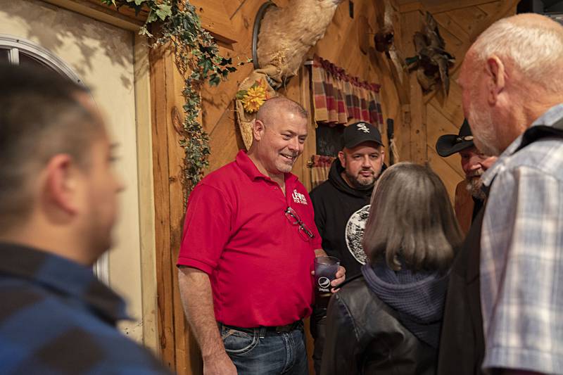 Whiteside County sheriff candidate Mike Lewis meets with supports during an election party Tuesday, Nov. 8, 2022 at Wagon Wheel in Sterling.