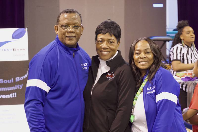 Lonnie Posley, pastor of New Canaan Christian Church, Michelle Stiff, a candidate for Will County Clerk, and Posley's wife, Rhonda Posley, at the Super Soul Bowl Sunday community event on Sunday, Feb. 8, 2026, at the church on 225 E. Clinton St., Joliet.
